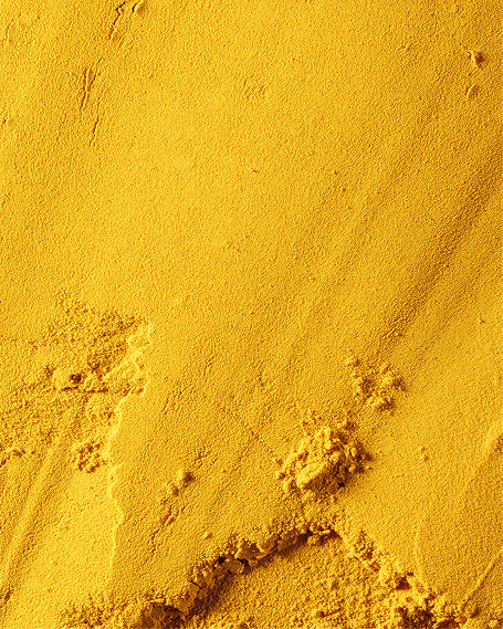 Close-up of powdered yellow turmeric