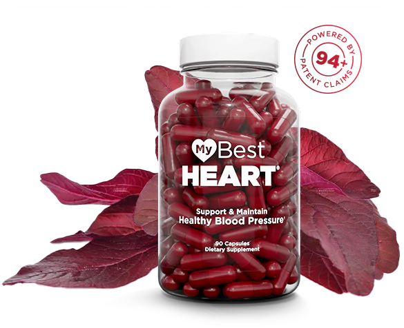 Bottle of 'My Best Heart' dietary supplement with red capsules and leaves on a white background
