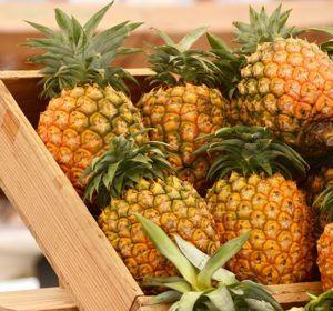 Is-Pineapple-Good-for-Digestion-pineapples-in-a-bin